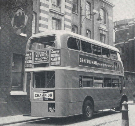 A bus is an unusual site in Brick lane, in 1952; along with its Trumans advertising panels