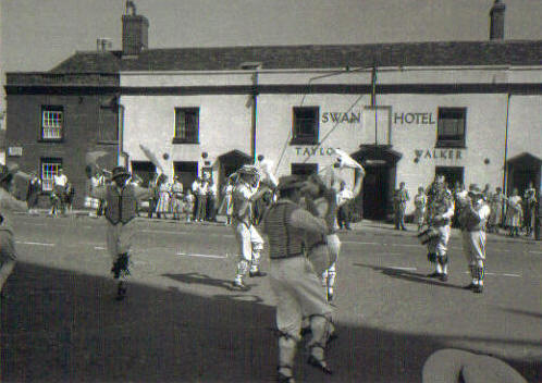 Swan Thaxted with Morris Dancers in the foreground