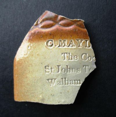 Looks like a sherd of a Reform Flask, named C Mayl[ard], The Cock, St Johns Terrace, Walham , crediting Germander for the image, and Rusty.