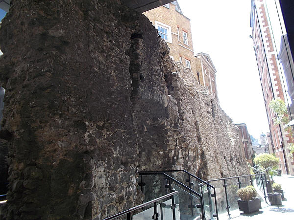 The amazing London wall in Coopers row, with the Crescent in the background - in May 2019