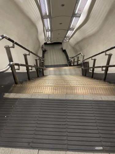 Lancaster Gate stairs down towards the Central line, in April 2023.